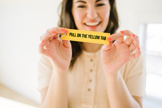 Pull on the Yellow Tab Keychain - Lettie Boutique